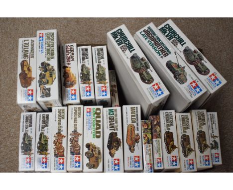 Tamiya 1:35 scale military vehicle model constructor kits.