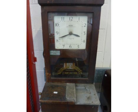 A NATIONAL TIME RECORDER CO, LTD CLOCKING IN MACHINE, not tested, height approximately 82cm, square dial, some wear/damage