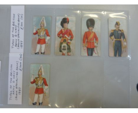 A COMPLETE SET OF LAMBERT & BUTLER 'TYPES OF THE BRITISH ARMY AND NAVY', dating from 1897 (four cards with brown specialities