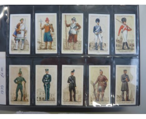 A CIGARETTE CARD ALBUM OF JOHN PLAYER & SONS, Uniforms of the Territorial Army 1939, complete + 10 varieties, Useful Plants &