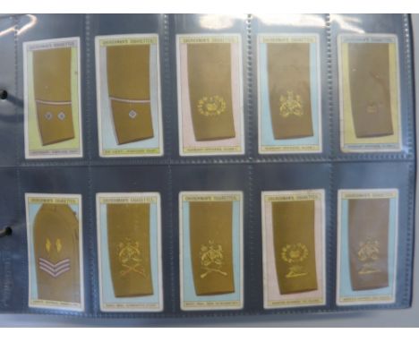 A CIGARETTE CARD ALBUM, loosely inserted, mixture of complete and incomplete sets issued by W.A. & A.C. Churchman, to include