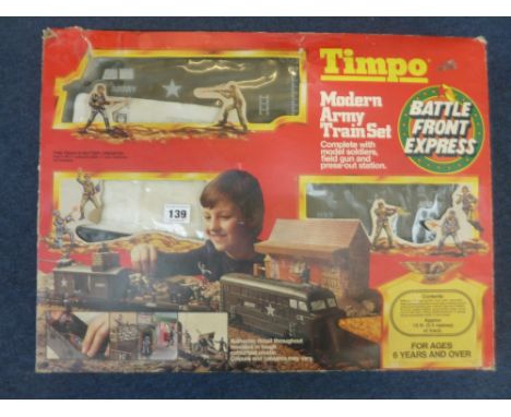 A BOXED TIMPO TOYS MODERN ARMY TRAIN SET, No.245, missing station building and original toy soldiers but otherwise appears la