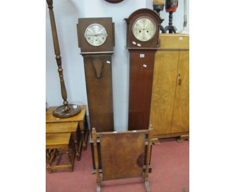 A 1930's Oak Grandmother Clock, together with one other grandmother clock and a  fire screen. (3).