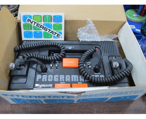 A Boxed Interstate Model 1125 Programaster Console, with cassette 6/0 and instruction manual (untested).