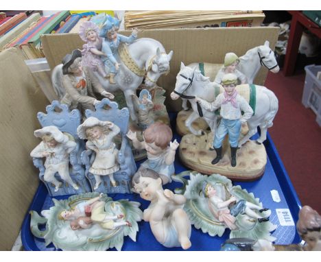 Continental Bisque Figure Group "Lift Me Up Daddy", other bisque figures, bisque piano top figures:- One Tray