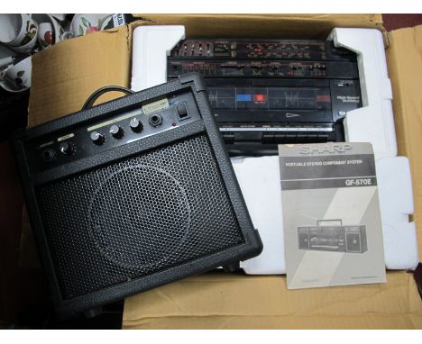 A Boxed Sharp GF-570E Stereo Component System, with two speakers, together with a Kingsman 10 watt base amplifier (untested s