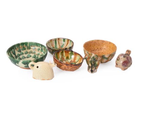Three Chinese Sancai pottery bowls, between 11cm and 9.5cm diameter and a Chinese 'Green Splashed' bowl, 12.5cm diameter; a m
