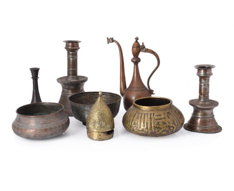 A large group of metalwork, Near East, Central Asia and India, 17th century and later, comprising: two small Safavid bowls, o