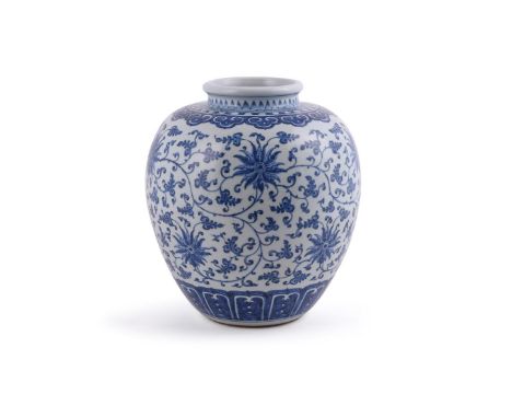 A Chinese blue and white jar, 18th century, of squat ovoid shape, the exterior painted in the Ming style with dense leafy lot