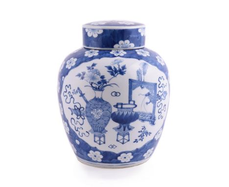 A Chinese blue and white ginger jar and cover, late Qing Dynasty, 19th century, painted with panels of precious objects on a 