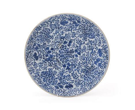 A Chinese blue and white charger, Kangxi, painted with peonies and foliage, 35cm diameter清康熙 青花大盘  Condition Report:  minor f