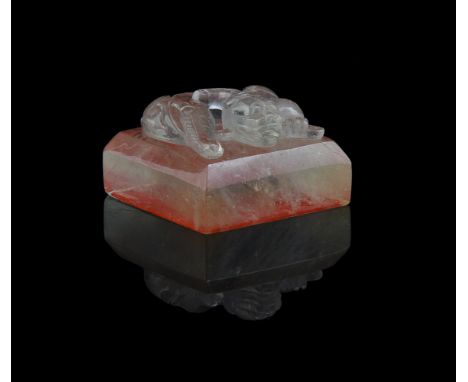 A Chinese rock crystal 'dragon' seal, of square form, seal face carved, 4.2cm square水晶螭龙钮印Condition Report: with natural flaw