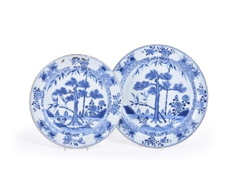 Two Chinese blue and white dishes, Kangxi, with pine, bamboo and peony, 35.3cm diameter and 31.3cm diameter (2) 清康熙 岁寒三友图盘两件C
