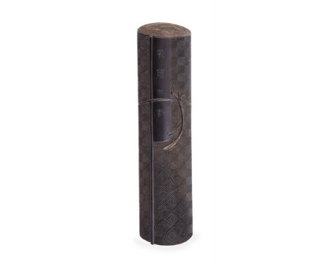 A Chinese zitan paperweight, in the form of a scroll with incised designs and tied with a 'bow' with a panel inscribed with f