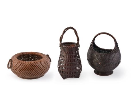 An Unusual Japanese Basket, the double-walled receptacle of annular form woven from fine strips of bamboo, either side with a