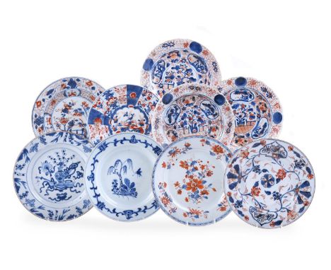 A group of nine Chinese Export plates, mainly Kangxi, comprising: three Imari shallow bowls, 22cm diameter; four various Imar