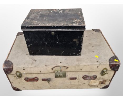 An early 20th-century canvas-bound trunk, and a lacquered metal deed box.