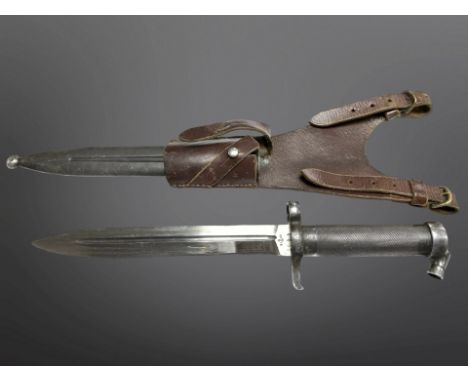 A Swedish M 1896 NCO's bayonet with scabbard and leather frog, crossguard with unit markings.