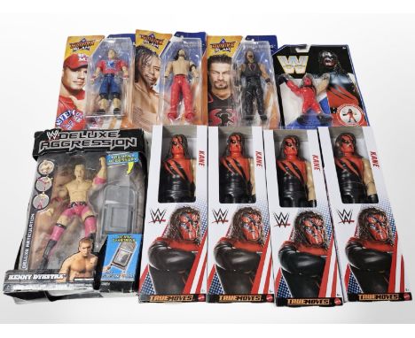 Nine various Mattel and Jakks Wrestling figurines, boxed.