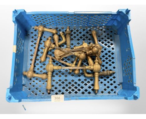 A crate of vintage brass door handles 