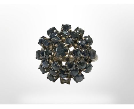A 14ct gold sapphire cluster ring (one stone deficient), size M