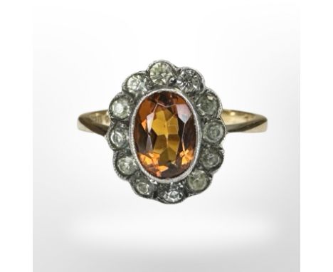 A 9ct gold and silver citrine cluster ring, size M CONDITION REPORT: 3.1g