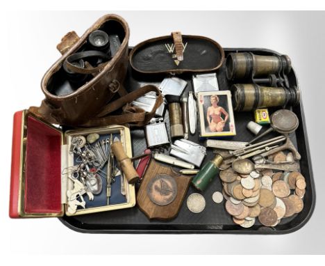 A group of collectables including lighters, binoculars, coins, pack of erotic playing cards, corkscrew, pocket knives and oth