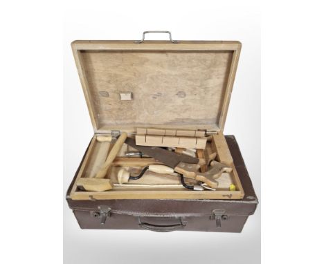 A small joiner's toolbox and contents, and a leather briefcase.