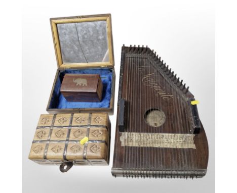 A La Marguerite auto harp, together with three wooden trinket boxes.