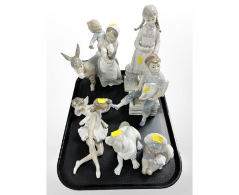 Seven assorted Lladró and Nao figures and groups, tallest 30cm.