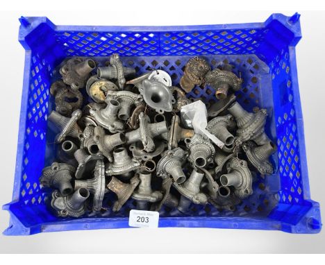 A crate of vintage metal door handle fittings 