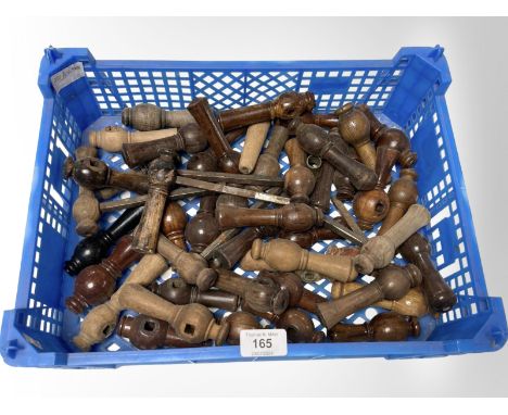 A crate of vintage wooden turned door handles 