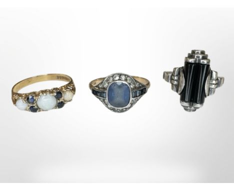 A 9ct gold sapphire and opal ring, a further 9ct sapphire cluster ring and a silver and black onyx ring.  CONDITION REPORT: T