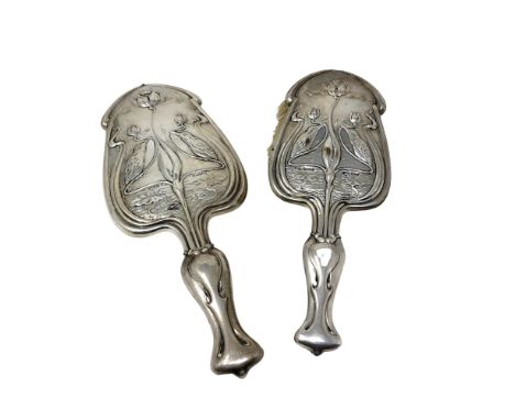 A fine quality Art Nouveau brush and hand mirror depicting kingfishers 