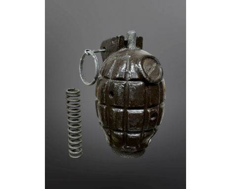 A British Army hand grenade Mills 36 M Mills bomb, with spring (separate), height 10cm. 