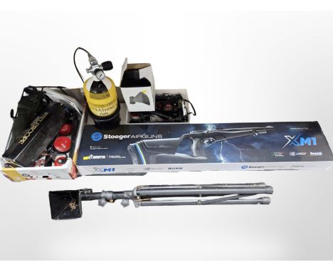 A Stoeger XM1 bolt-action PCP .22 calibre repeating air rifle, in original box with accessories and manual, three tins of pel