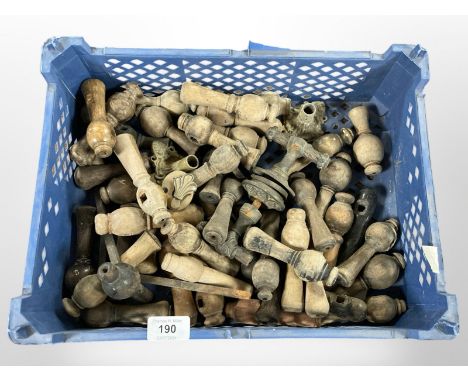 A crate of vintage wooden door handles 