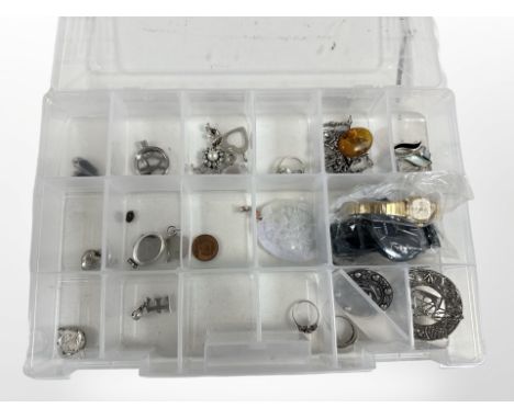 A group of silver jewellery including two viking longship brooches, an amber pendant on chain, various other pendants and loc