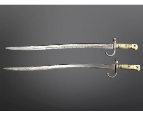 Two French M 1866 Chassepot bayonets, lacking scabbards. (2)