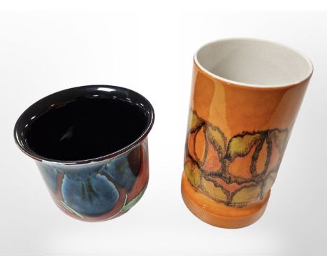 A Poole vase and pot, tallest 23cm.