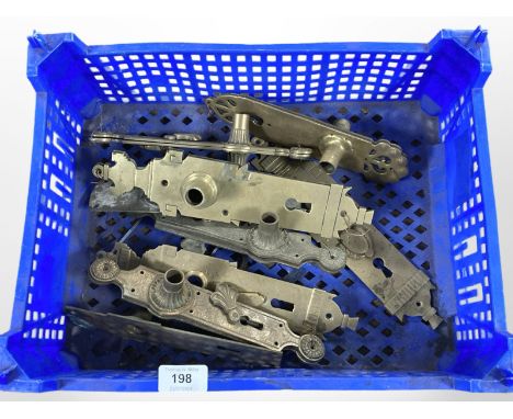 A crate of vintage brass door plates 