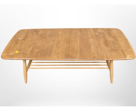 An Ercol elm and beech coffee table with under shelf, length 105 cm 