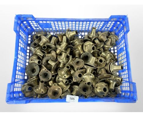 A crate of vintage brass door handle collars 