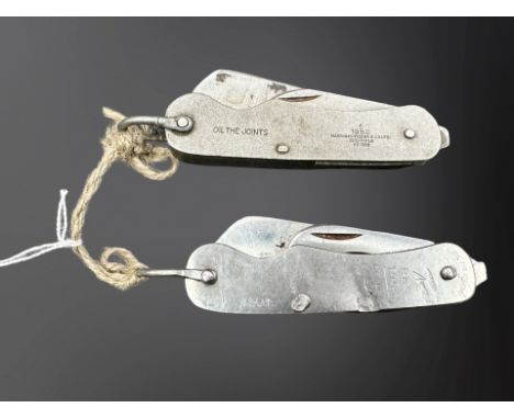 Two British Army steel clasp knives, one stamped '1952', the other stamped '1953'.