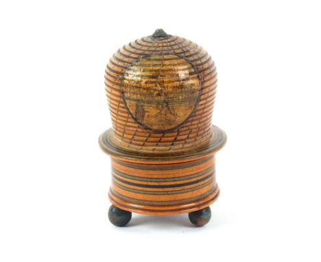An early print and paint decorated Tunbridge ware pin poppet in the form of a bee skep, with a circular colour print depictin