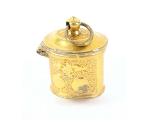 An 18th Century gilt metal thimble or patch box from a chatelaine, the body with panels of leaves and fruit below a hinged co