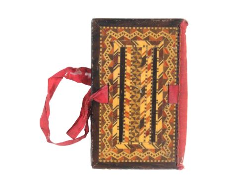 An unusual Tunbridge ware needle book, the rosewood boards externally decorated in a mixture of mosaic and stick ware in unus