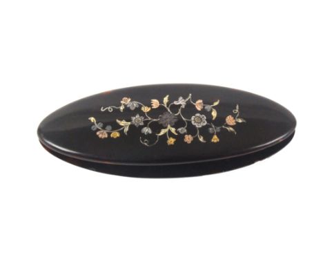 A late 18th Century tortoiseshell shuttle each side inlaid in three colour metals, with a panel of flowers and leaves, oval p