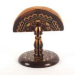 A rosewood Tunbridge ware ring stand and pin cushion, the fan form pin cushion in geometric mosaic