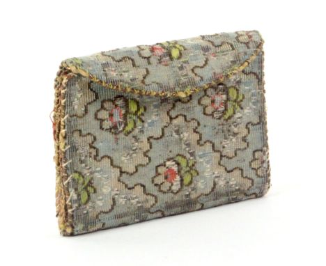 An 18th Century needle book of wallet form, in floral silk (probably Spitafields), with metal thread borders, the interior fi